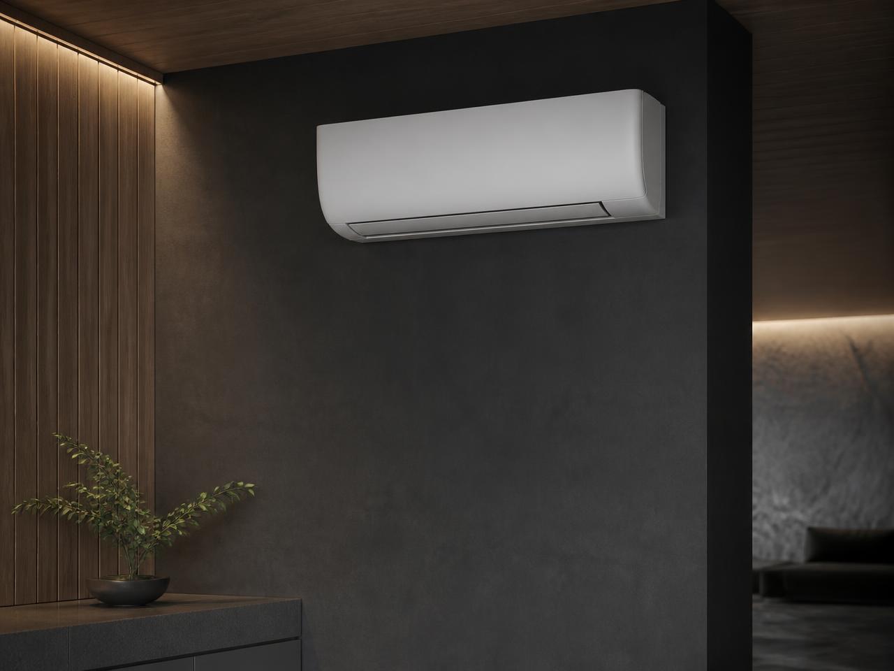 Discrete wandmodel airco in een donker interieur met eik en natuursteen